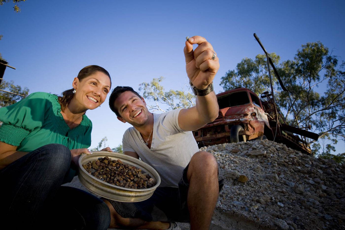 A couple fossicking for sapphires at the Queensland Sapphire Gemfields